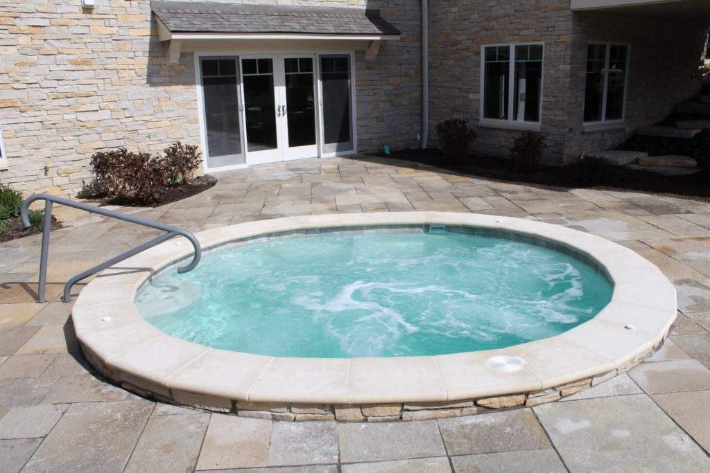 Oval Shotcrete Spa for Large enough for the entire family in Orland park IL