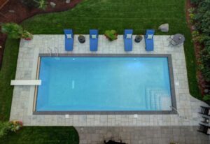 pool is complete with a diving board in Orland Park, IL