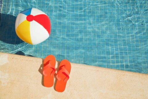 Summer vacation fun in Orland Park, IL – kids enjoying a sunny day in the swimming pool.